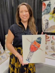 Amy Paquette with bird art
